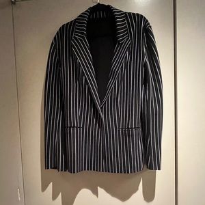 Norma Kamali’s pinstripe blazer